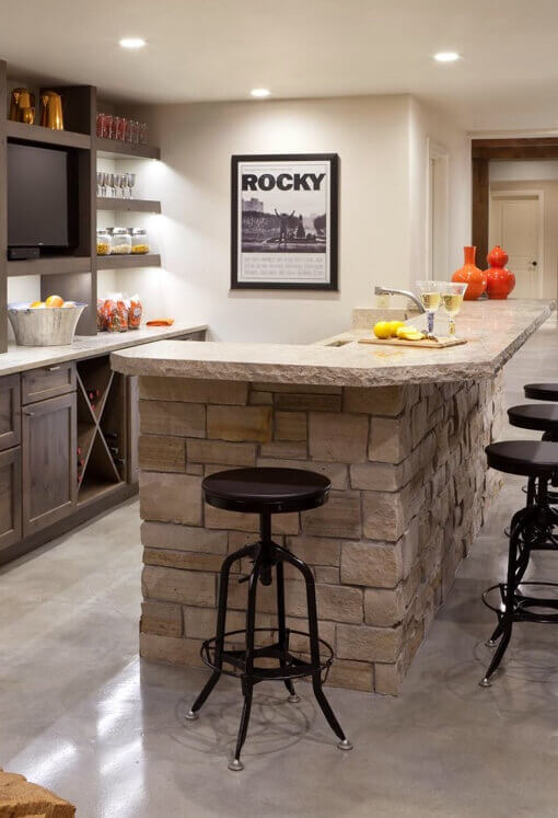 Stone bar with dark cabinets